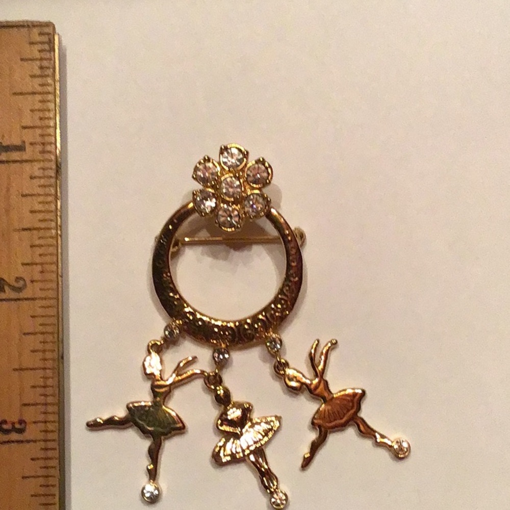 New Dangling Ballerina Pin. Gold tone set with clear crystals